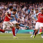 2026-04-19T155007Z_194727004_UP1EM4J17ZIU5_RTRMADP_3_SOCCER-ENGLAND-MCI-ARS-1776613907