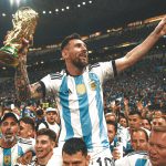 lionel-messi-lifiting-the-2022-fifa-world-cup-trophy-v0-6ib1hrf1bu6a1