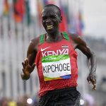 topshot-kenyas-eliud-kipchoge-celebrates-after-winning-the-mens-marathon-athletics-event-of